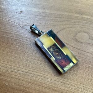 Amber inlay pendant